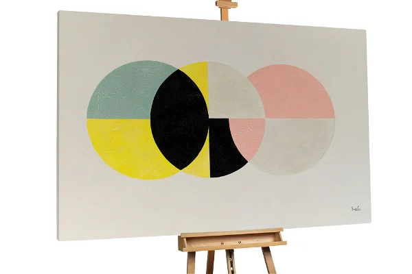 Abstract canvas with four overlapping circles in muted colors.