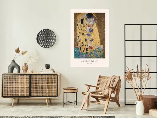 Contemporary interior space featuring Gustav Klimt's 'The Kiss' art print on the wall, complemented by elegant furniture and decorative elements.