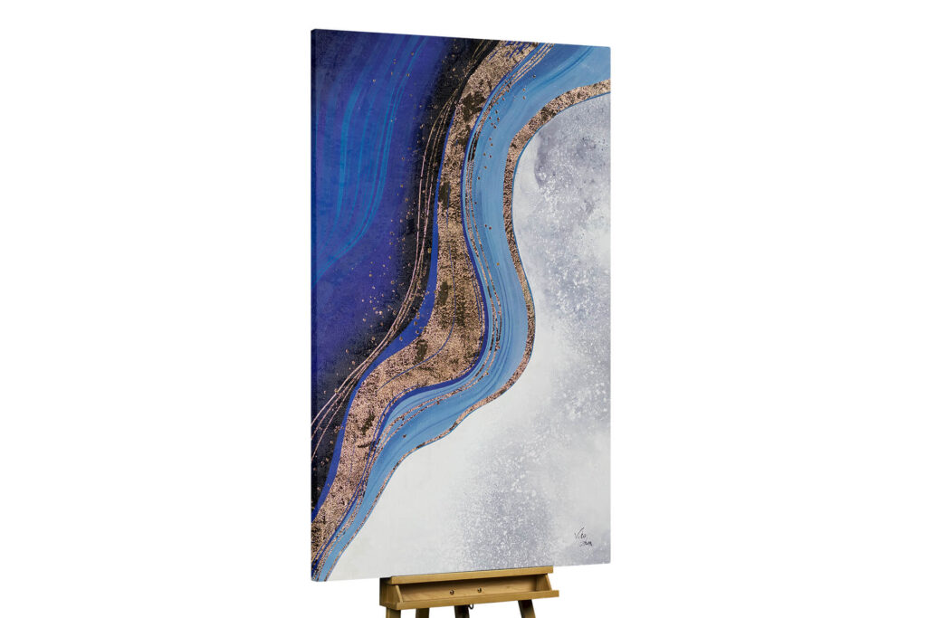 A vertical canvas art piece titled "Creek of Life" featuring abstract flowing waves of deep blue, white, and shimmering gold lines.