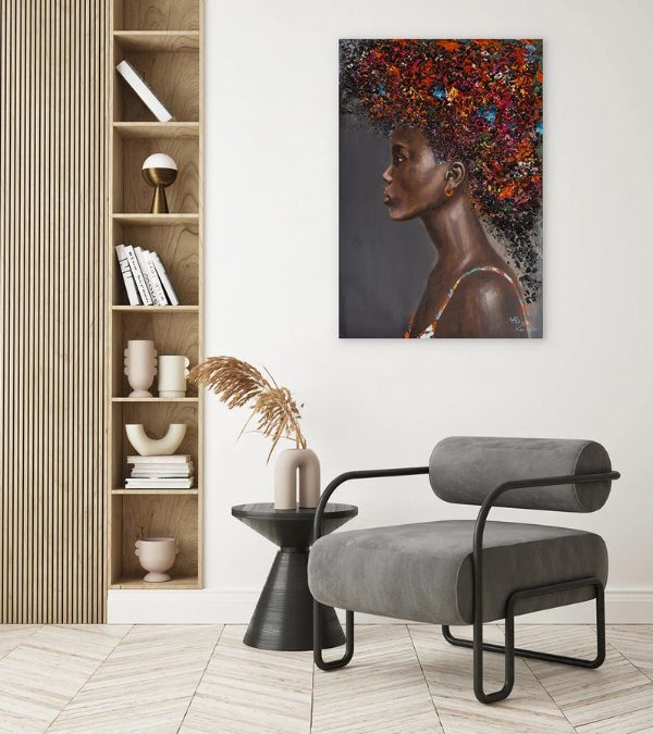 An interior design mockup featuring a portrait painting titled "Flora's Beauty" depicting a Black woman with colorful flowers in her hair, styled in a minimalist room.